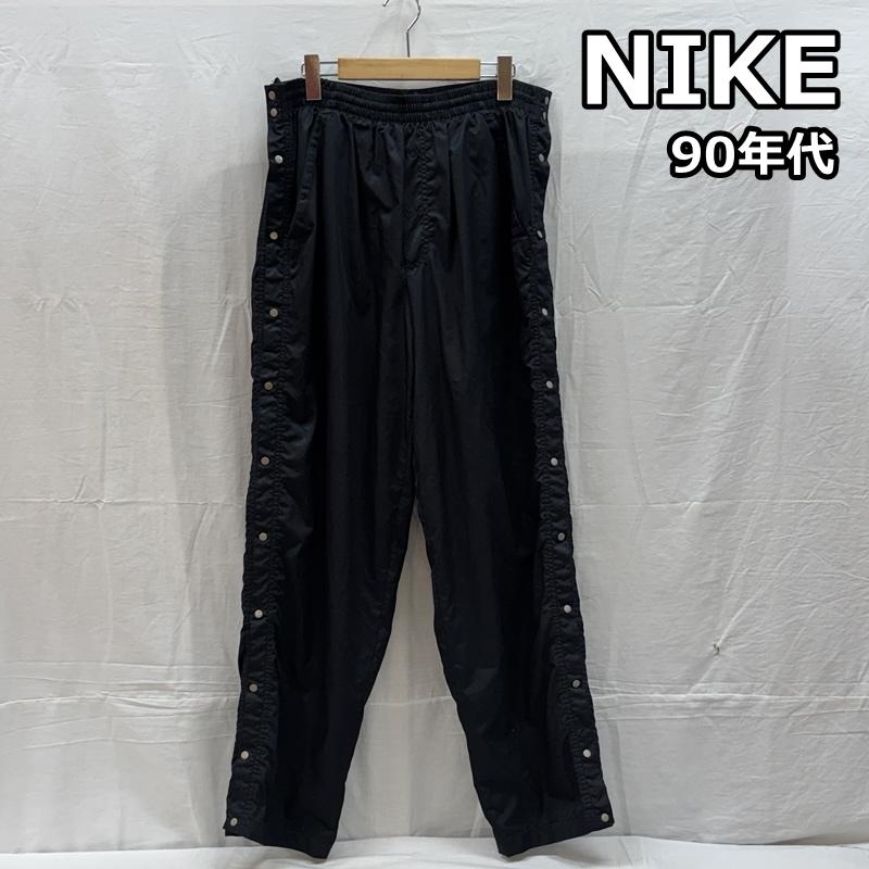 ナイキ NIKE ボトムス ボトムス 90年代 ビンテージ タイ製 サイドボタン ナイロン トラック パンツ 90s VINTAGE M 黒 / ブラック / black メンズ USED 古着 中古 50162652
