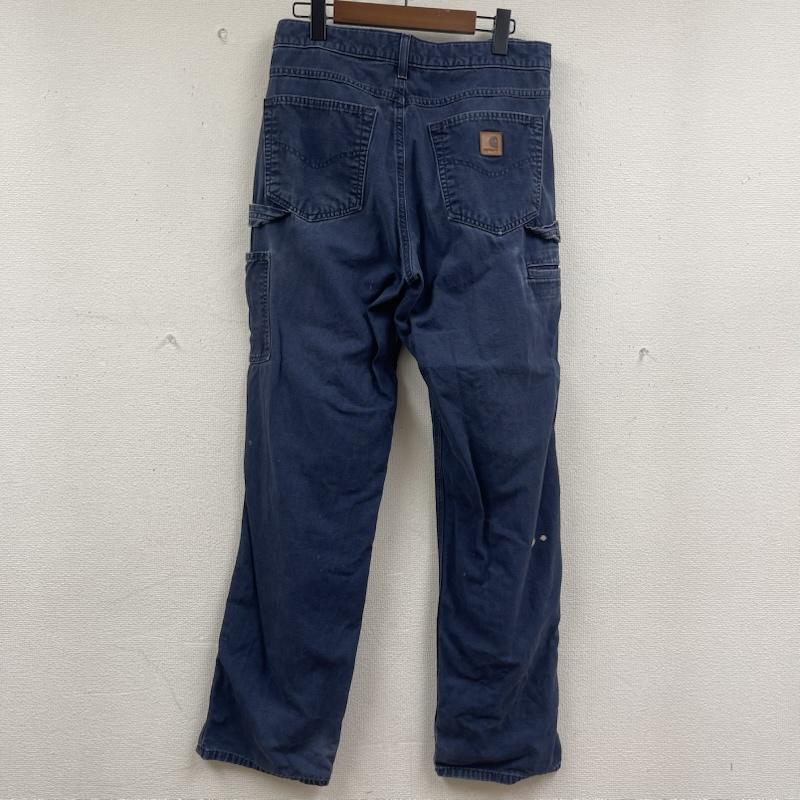 カーハート Carhartt パンツ ワークパンツ、ペインターパンツ ルーズフィット ロゴパッチ キャンバスカー ペンター パンツ 31インチ インディゴ / インディゴ / Indigo メンズ USED 古着 中古 50163356