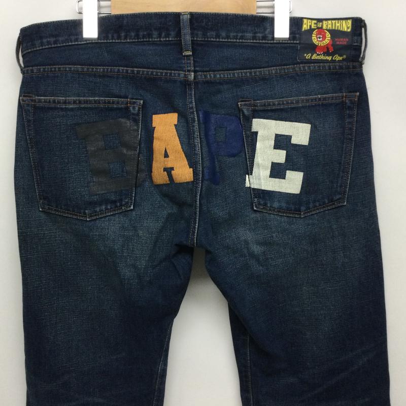 アベイシングエイプ A BATHING APE パンツ デニム、ジーンズ バックロゴプリント デニムパンツ ジーンズ 日本製 XL ロゴ、文字 インディゴ / インディゴ / Indigo メンズ USED 古着 中古 50163656