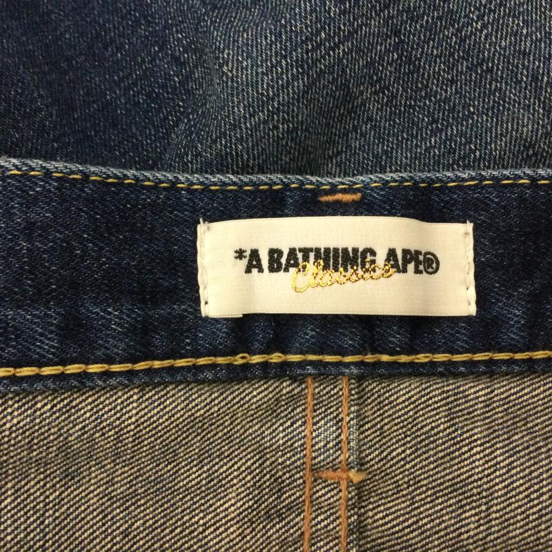 アベイシングエイプ A BATHING APE パンツ デニム、ジーンズ バックロゴプリント デニムパンツ ジーンズ 日本製 XL ロゴ、文字 インディゴ / インディゴ / Indigo メンズ USED 古着 中古 50163656