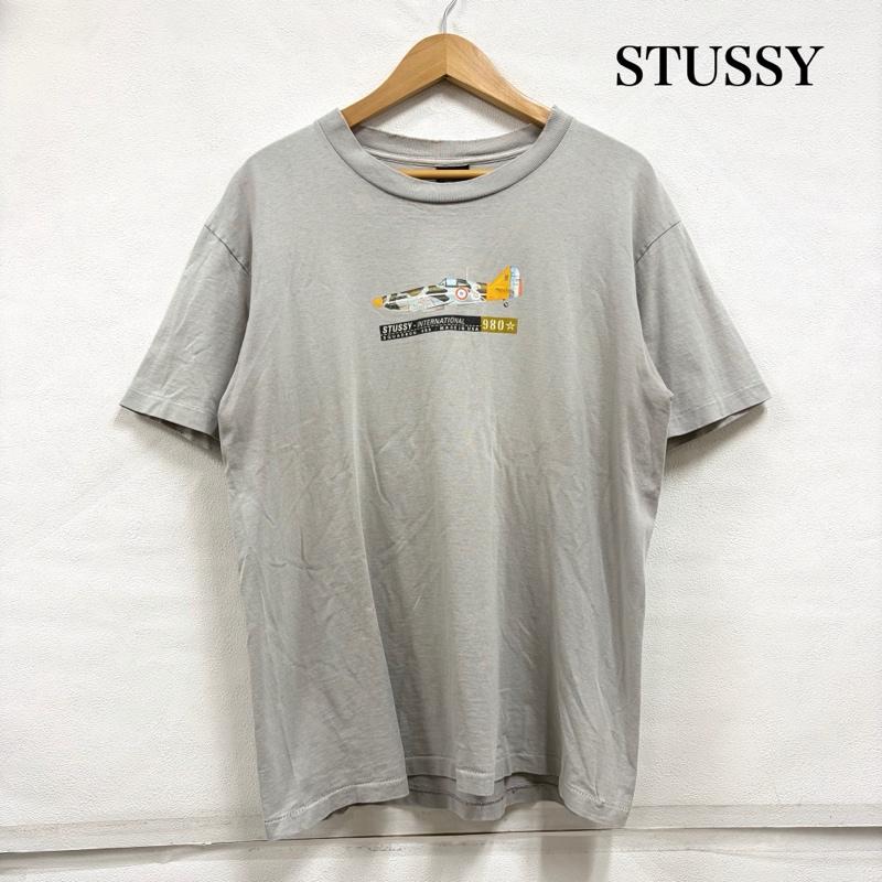 ステューシー STUSSY Tシャツ 半袖 90s OLD オールド ロゴ 戦闘機 プリント 半袖 TシャツUSA製 ヴィンテージ 紺タグ シングルステッチ フェード L ロゴ、文字 X プリント 灰 / グレー / gray メンズ USED 古着 中古 50164451