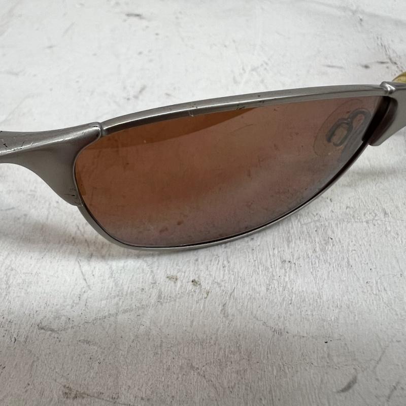 オークリー OAKLEY めがね・サングラス サングラス Wiretap ワイヤータップ メタルフレーム サングラス - 銀 / シルバー / silver color X 茶 / ブラウン / brown メンズ USED 古着 中古 50164494