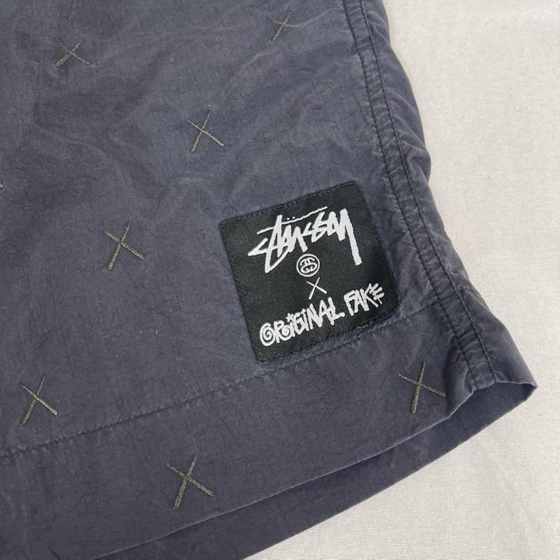 ステューシー STUSSY パンツ ショートパンツ OriginalFake コラボ ストックロゴ スイム サーフ ショーツ KAWS カウズ 3 黒 / ブラック / black メンズ USED 古着 中古 50164721