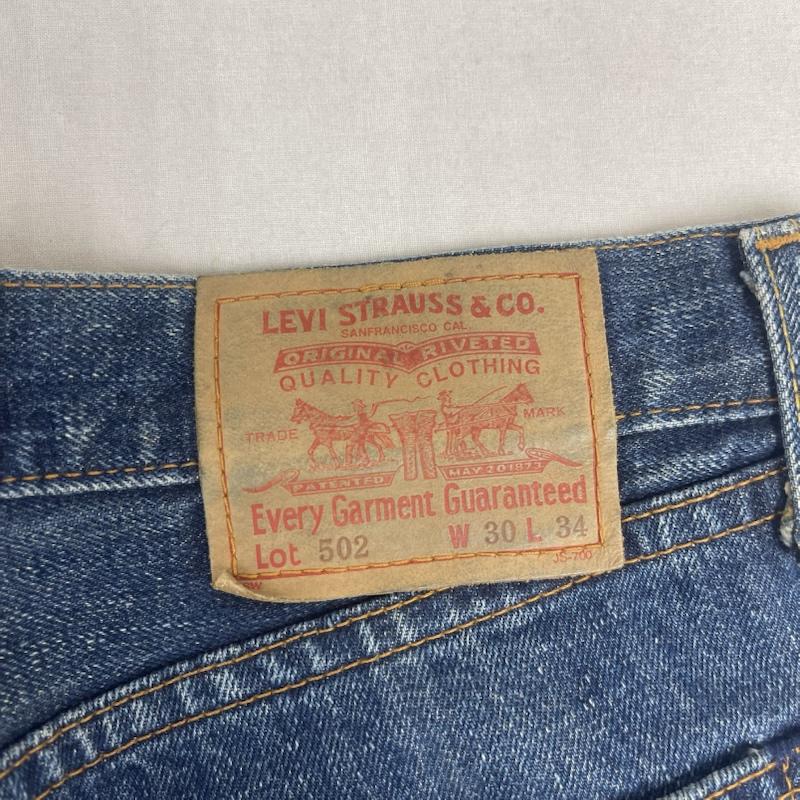 リーバイス Levi s パンツ デニム、ジーンズ 日本製 502 ジップフライ ストレート デニム パンツ 30インチ インディゴ / インディゴ / Indigo メンズ USED 古着 中古 50164776