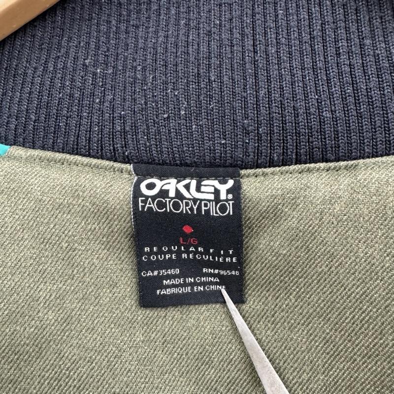 オークリー OAKLEY ジャケット、上着 フライトジャケット バイカラー 2トーン 切り替え スナップボタン キルティング 中綿 スタジャン ボンバージャケット MA-1 L カーキ / カーキ / khaki メンズ USED 古着 中古 50165210