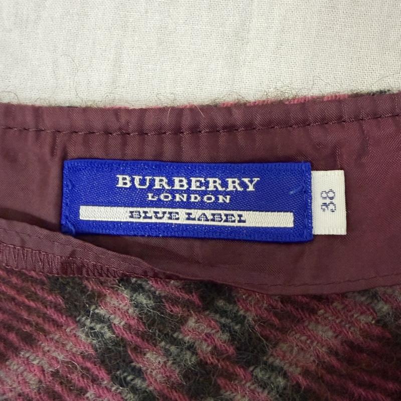 バーバリーロンドン Burberry London スカート ミニスカート ラップスカート風 フレアミニスカート リボン チェック 赤系 38 チェック 桃 / ピンク / pink X えんじ / ワインレッド / dark red レディース USED 古着 中古 50165326