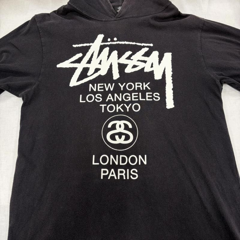 ステューシー STUSSY パーカー 長袖 ワールドツアー 両面 プリント 薄手 ロゴ パーカー フーデッド 長袖 カットソー M ロゴ、文字 X プリント 黒 / ブラック / black X 白 / ホワイト / white メンズ USED 古着 中古 50166119