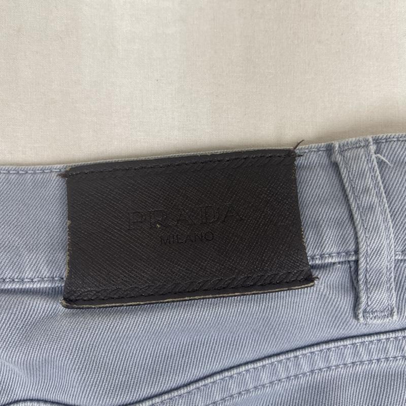 プラダ PRADA パンツ デニム、ジーンズ レザーパッチ ペイント テーパード デニム パンツ ボトムス 31インチ 水色 / ライトブルー / メンズ USED 古着 中古 50166180