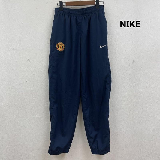 ナイキ NIKE パンツ ワークパンツ、ペインターパンツ 00s マンチェスター・ユナイテッド エンブレム ウィンドブレーカー パンツ M 紺 / ネイビー / navy メンズ USED 古着 中古 50166271