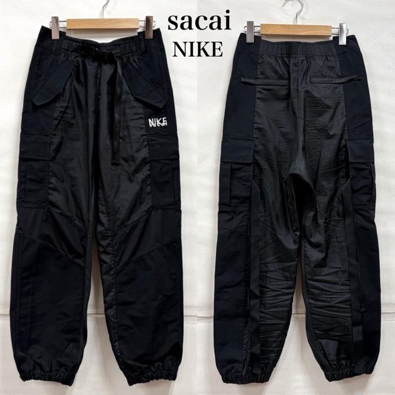 サカイ Sacai パンツ ワークパンツ、ペインターパンツ NIKEコラボ AS U NRG Pant ナイロン トラック カーゴパンツ ロゴ DQ9061-010 S ワンポイント X ロゴ、文字 X プリント 黒 / ブラック / black X 白 / ホワイト / white メンズ USED 古着 中古 50166602