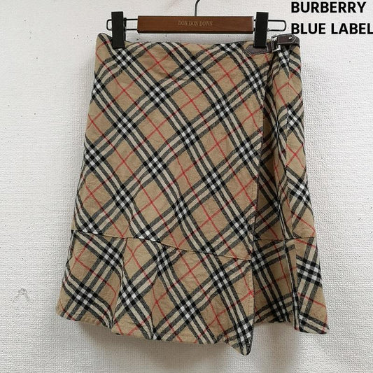 バーバリー・ブルーレーベル BURBERRY BLUE LABEL スカート ひざ丈スカート ノバチェック アシンメトリー レザー ベルト ラップ風 フレア スカート FLF74-520 38 ベージュ / ベージュ / beige レディース USED 古着 中古 50166689