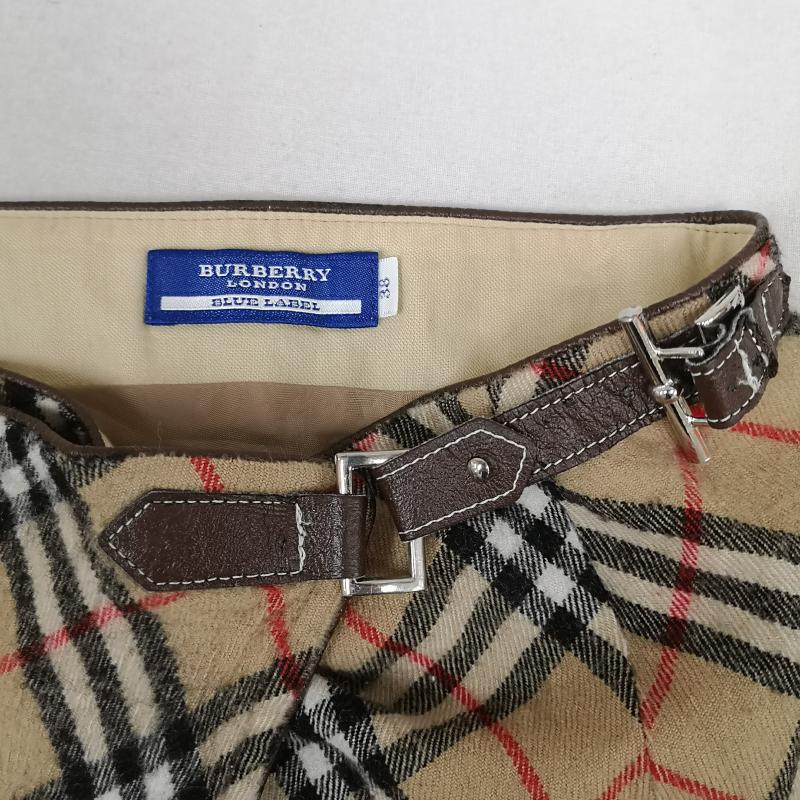バーバリー・ブルーレーベル BURBERRY BLUE LABEL スカート ひざ丈スカート ノバチェック アシンメトリー レザー ベルト ラップ風 フレア スカート FLF74-520 38 ベージュ / ベージュ / beige レディース USED 古着 中古 50166689