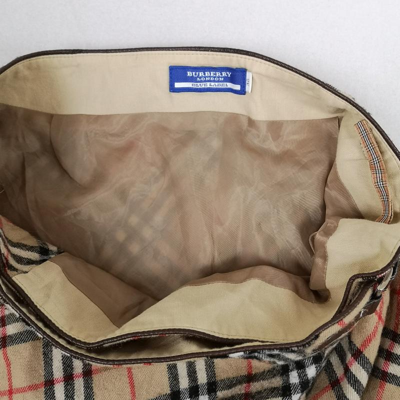 バーバリー・ブルーレーベル BURBERRY BLUE LABEL スカート ひざ丈スカート ノバチェック アシンメトリー レザー ベルト ラップ風 フレア スカート FLF74-520 38 ベージュ / ベージュ / beige レディース USED 古着 中古 50166689