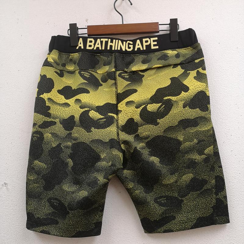 アベイシングエイプ A BATHING APE パンツ ショートパンツ 16SS NOISE CAMO カモ柄 スウェットショート パンツ ショーツ M 黒 / ブラック / black X 黄 / イエロー / yellow メンズ USED 古着 中古 50169143
