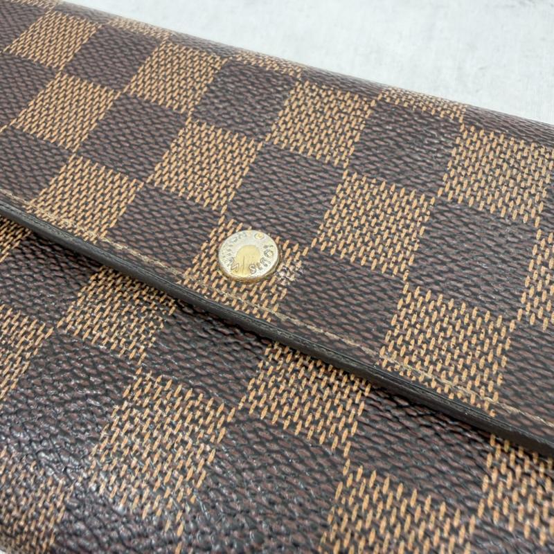 ルイヴィトン LOUIS VUITTON 財布 長財布 ダミエ レザー 二つ折り 長財布 エベヌ ポルトフォイユ サラ - チェック X ロゴ、文字 茶 / ブラウン / brown メンズ USED 古着 中古 50170042