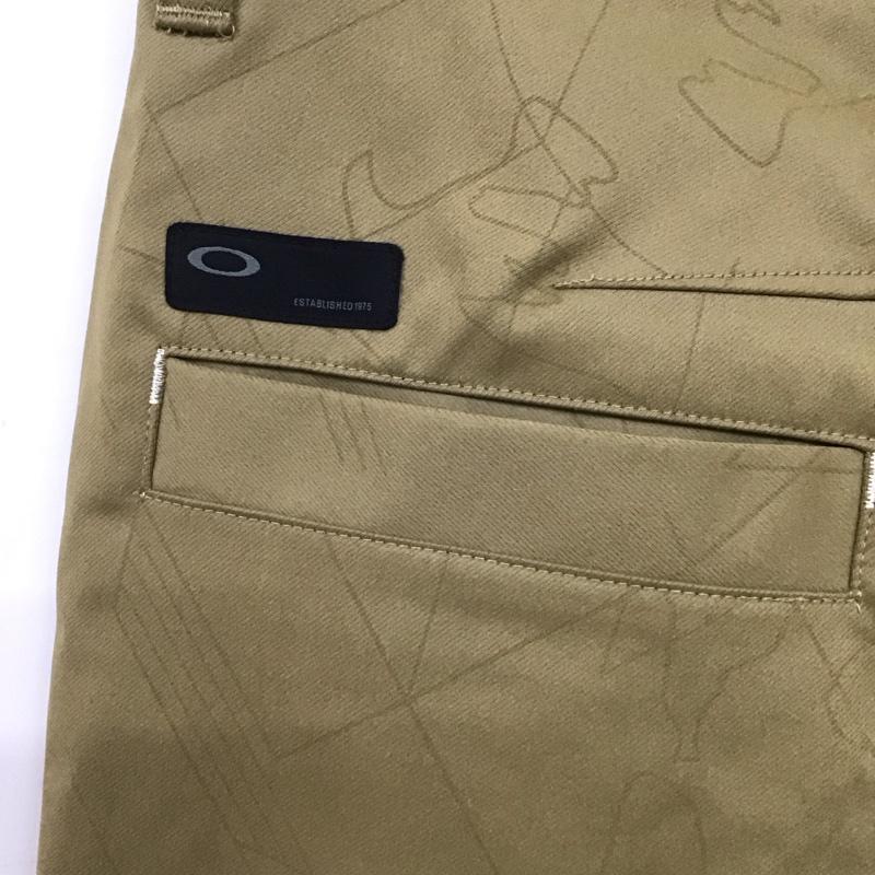 オークリー OAKLEY パンツ チノパン チノパン スリムパンツ カジュアルパンツ ストレッチパンツ 30インチ ロゴ、文字 ベージュ / ベージュ /  メンズ USED 古着 中古 10135730