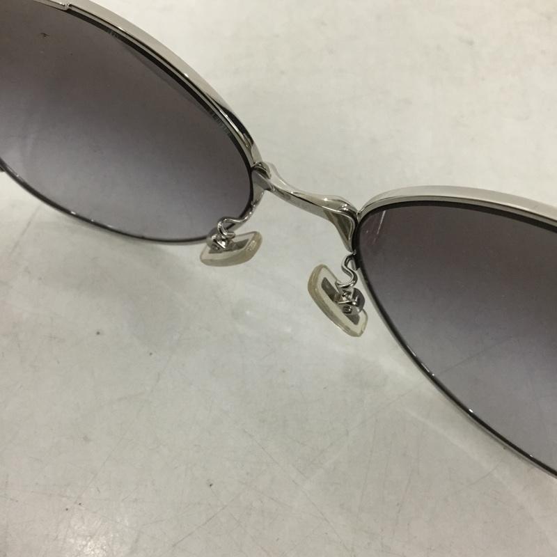 コーチ COACH めがね・サングラス サングラス HC7096B 900111 ロゴ、文字 銀 / シルバー /  レディース USED 古着 中古 10137398