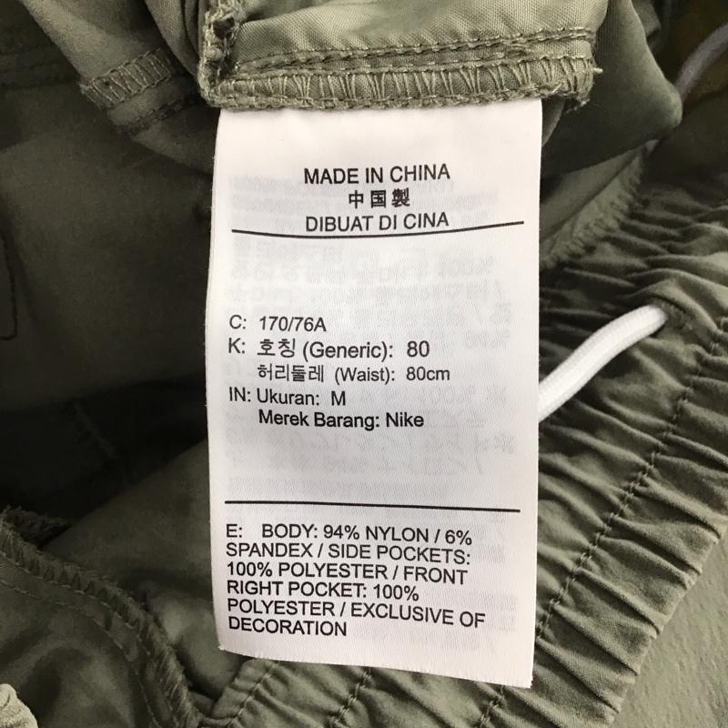 ナイキ NIKE パンツ ワークパンツ、ペインターパンツ dn4447-320 ワイドパンツ ナイロンパンツ M ロゴ、文字 カーキ / カーキ /  メンズ USED 古着 中古 10148330