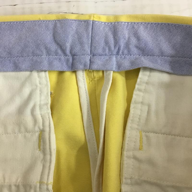 ラグビー RUGBY パンツ チノパン チノパン カジュアルパンツ ワイドパンツ ストレートパンツ 28インチ ロゴ、文字 黄 / イエロー /  メンズ USED 古着 中古 10120947