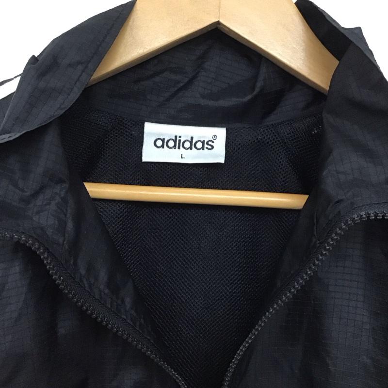 アディダス adidas ジャケット、上着 ジャンパー、ブルゾン ジップアップジャケット ナイロンジャケット アウター 古着 L ロゴ、文字 黒 / ブラック /  メンズ USED 古着 中古 10138882
