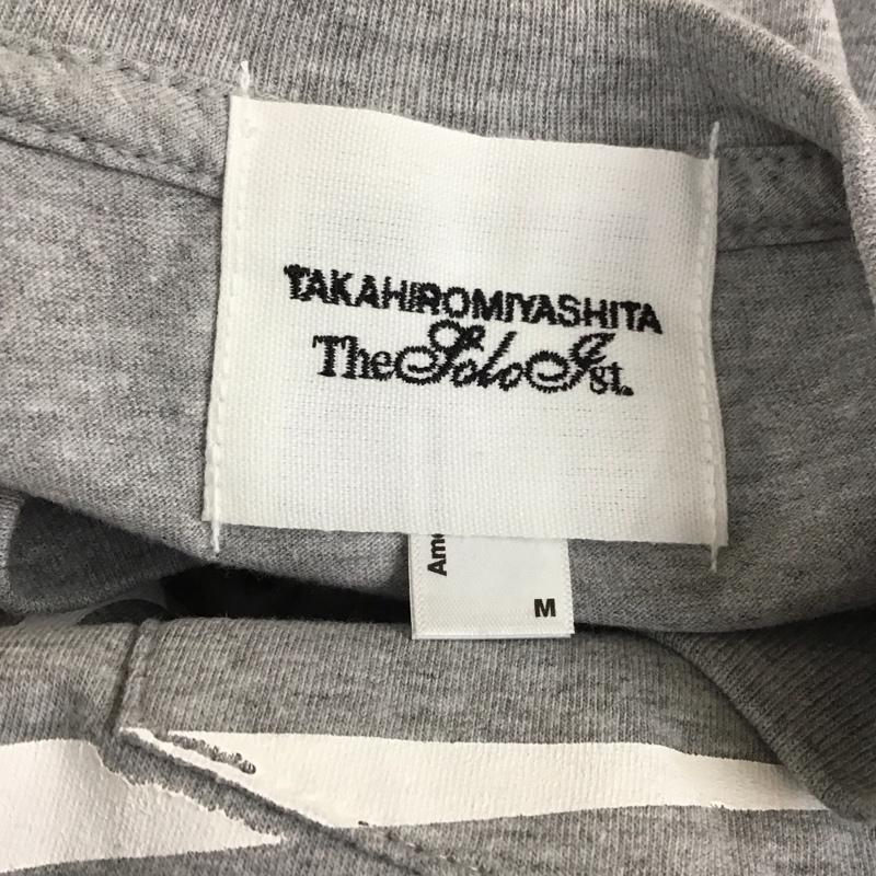 タカヒロ ミヤシタ ザ ソロイスト TAKAHIRO MIYASHITA The SoloIst. Tシャツ 半袖 中日ドラゴンズ M ロゴ、文字 X プリント 灰 / グレー /  メンズ USED 古着 中古 10111988