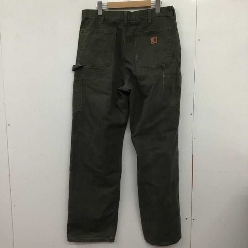 カーハート Carhartt パンツ ワークパンツ、ペインターパンツ ワイドパンツ カジュアルパンツ ワークパンツ 34 ロゴ、文字 カーキ / カーキ /  メンズ USED 古着 中古 10148567