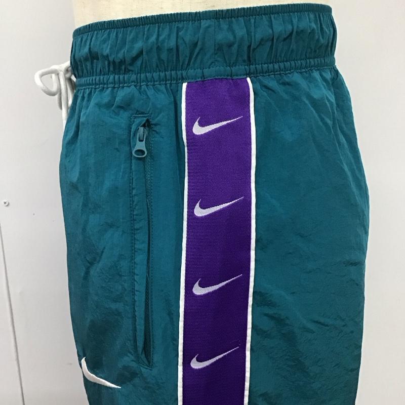 ナイキ NIKE パンツ ワークパンツ、ペインターパンツ cv9180-381 ワイドパンツ ジャージ ナイロンパンツ M ロゴ、文字 青 / ブルー /  メンズ USED 古着 中古 10119962