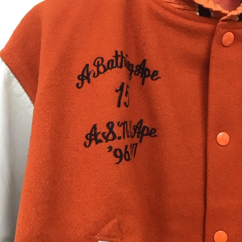 アベイシングエイプ A BATHING APE ジャケット、上着 ジャンパー、ブルゾン スタジャン アウター 古着 前ボタン postoveralls 96-97s L ロゴ、文字 橙 / オレンジ /  メンズ USED 古着 中古 10148160