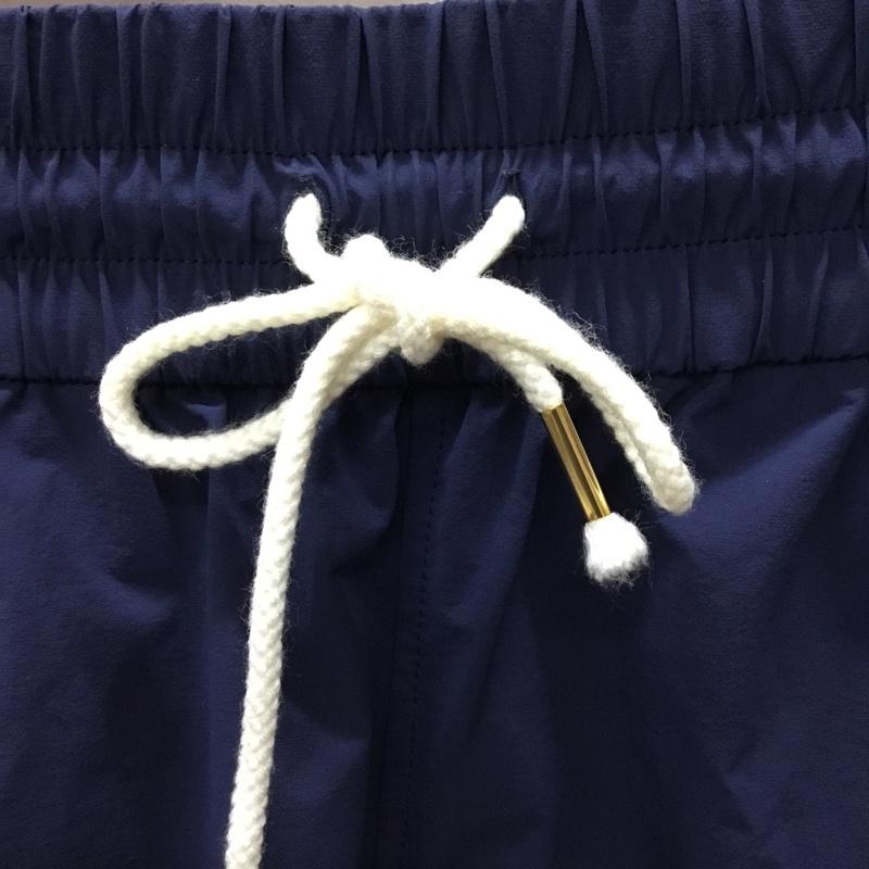 チャンピオン Champion パンツ ショートパンツ cw-ms505 クロスハーフパンツ ショートパンツ カジュアルパンツ M ロゴ、文字 紺 / ネイビー /  レディース USED 古着 中古 10113324