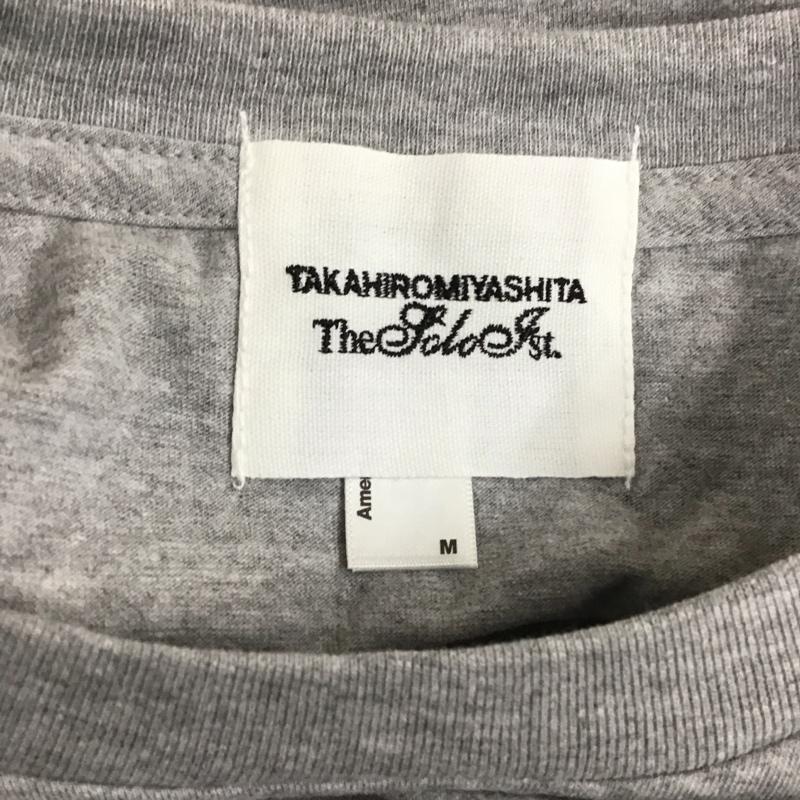 タカヒロ ミヤシタ ザ ソロイスト TAKAHIRO MIYASHITA The SoloIst. Tシャツ 半袖 阪神タイガース M プリント X ロゴ、文字 灰 / グレー /  メンズ USED 古着 中古 10111983