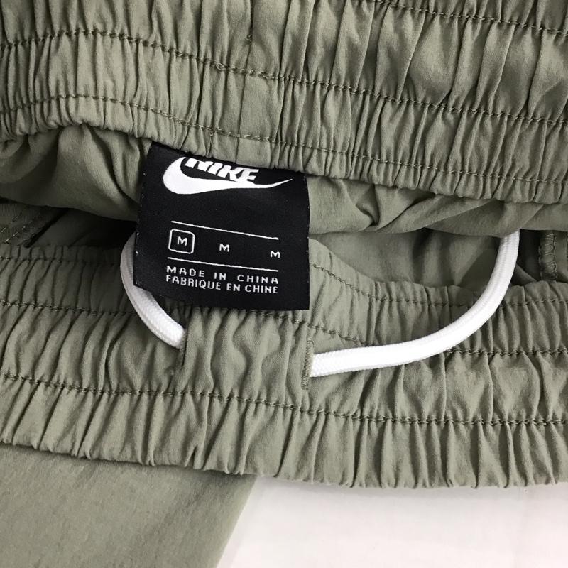 ナイキ NIKE パンツ ワークパンツ、ペインターパンツ dn4447-320 ワイドパンツ ナイロンパンツ M ロゴ、文字 カーキ / カーキ /  メンズ USED 古着 中古 10148330