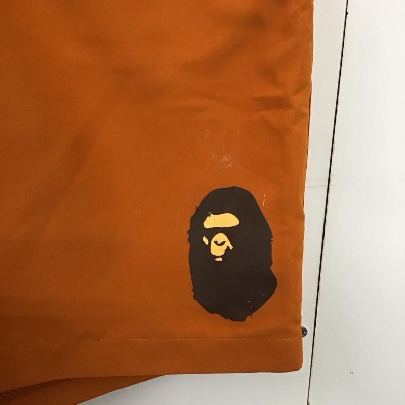 アベイシングエイプ A BATHING APE パンツ ショートパンツ ハーフパンツ ショートパンツ カジュアルパンツ L ロゴ、文字 橙 / オレンジ /  メンズ USED 古着 中古 10142630