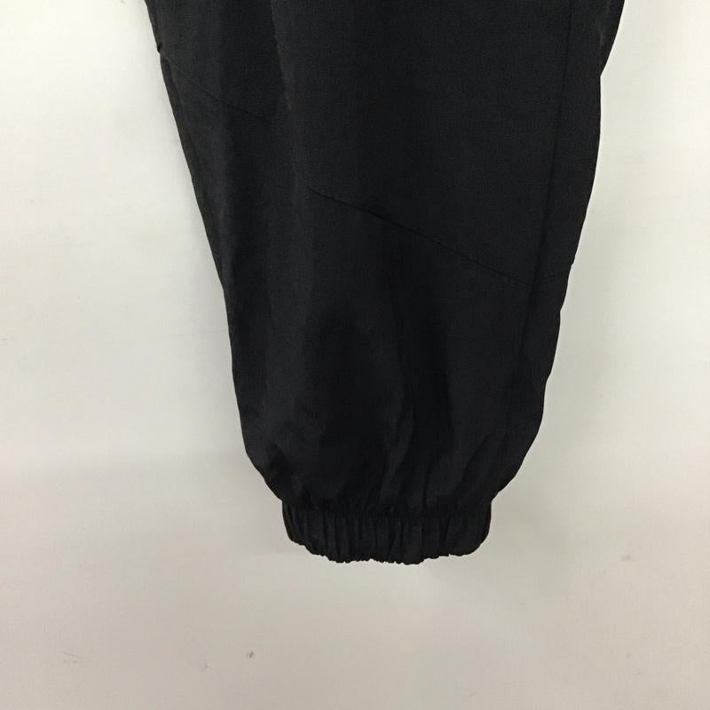 ナイキ NIKE パンツ ワークパンツ、ペインターパンツ fb8617-010 ウィンターウーブンパンツ ワイドパンツ スポーツウェア XL ロゴ、文字 黒 / ブラック /  メンズ USED 古着 中古 10142342