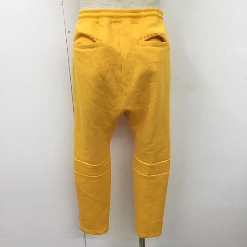 チャンピオン Champion ボトムス ボトムス C8-P205 Champion×X-LARGE REVERSEWEAVEPANT スウェットパンツ コラボ M ロゴ、文字 黄 / イエロー /  メンズ USED 古着 中古 10110333