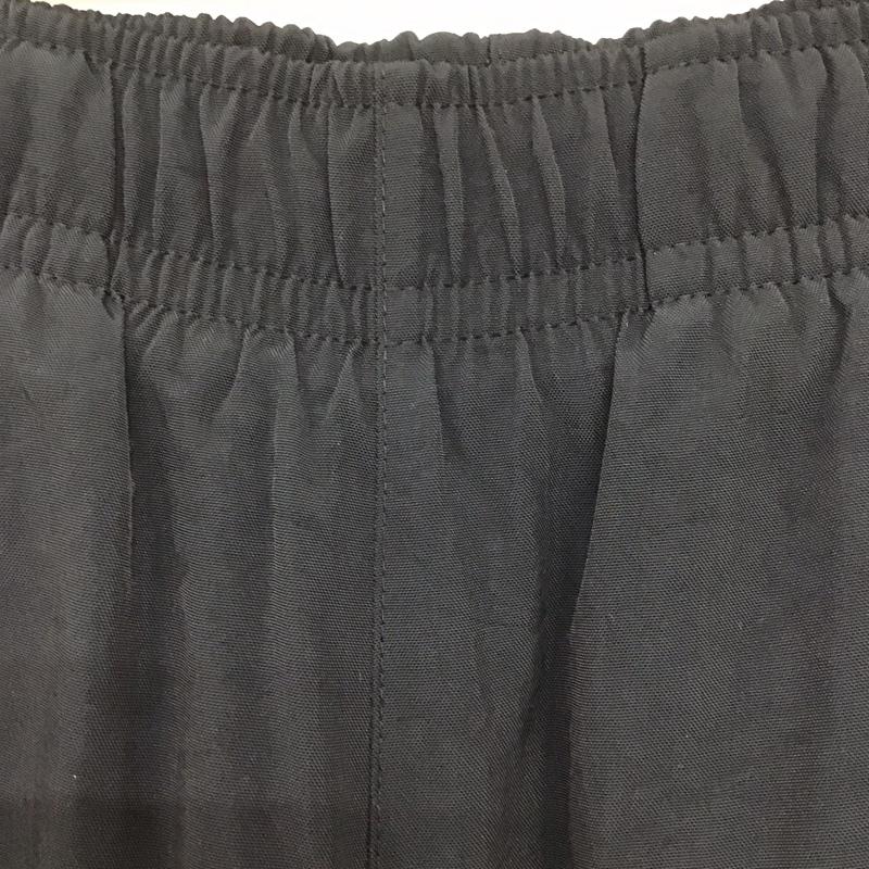 ナイキ NIKE パンツ ワークパンツ、ペインターパンツ fb8617-010 ウィンターウーブンパンツ ワイドパンツ スポーツウェア XL ロゴ、文字 黒 / ブラック /  メンズ USED 古着 中古 10142342