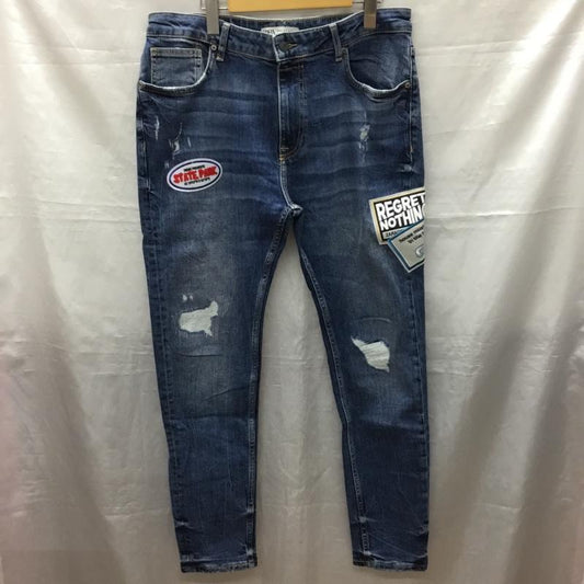 ザラ ZARA パンツ デニム、ジーンズ デニムパンツ スリムパンツ ストレッチパンツ ジーンズ ワッペン 46インチ ロゴ、文字 インディゴ / インディゴ /  メンズ USED 古着 中古 10120253