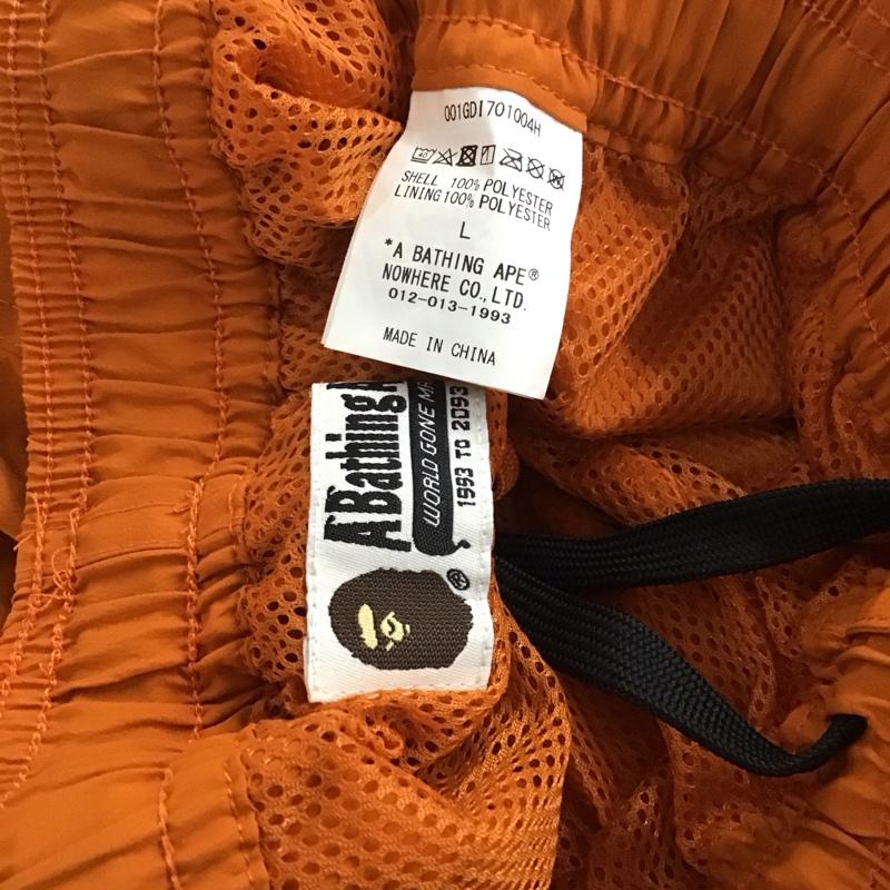 アベイシングエイプ A BATHING APE パンツ ショートパンツ ハーフパンツ ショートパンツ カジュアルパンツ L ロゴ、文字 橙 / オレンジ /  メンズ USED 古着 中古 10142630