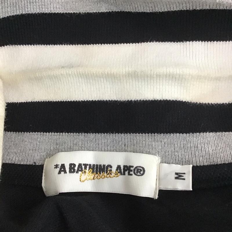 アベイシングエイプ A BATHING APE ポロシャツ 半袖 半袖ポロシャツ カラーシャツカットソー 半袖カットソー M ロゴ、文字 黒 / ブラック /  メンズ USED 古着 中古 10112085