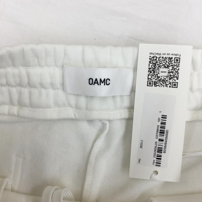オーエーエムシー OAMC パンツ サルエルパンツ 23A28OAJ29 23AW スウェットパンツ L ロゴ、文字 白 / ホワイト /  メンズ USED 古着 中古 10124451