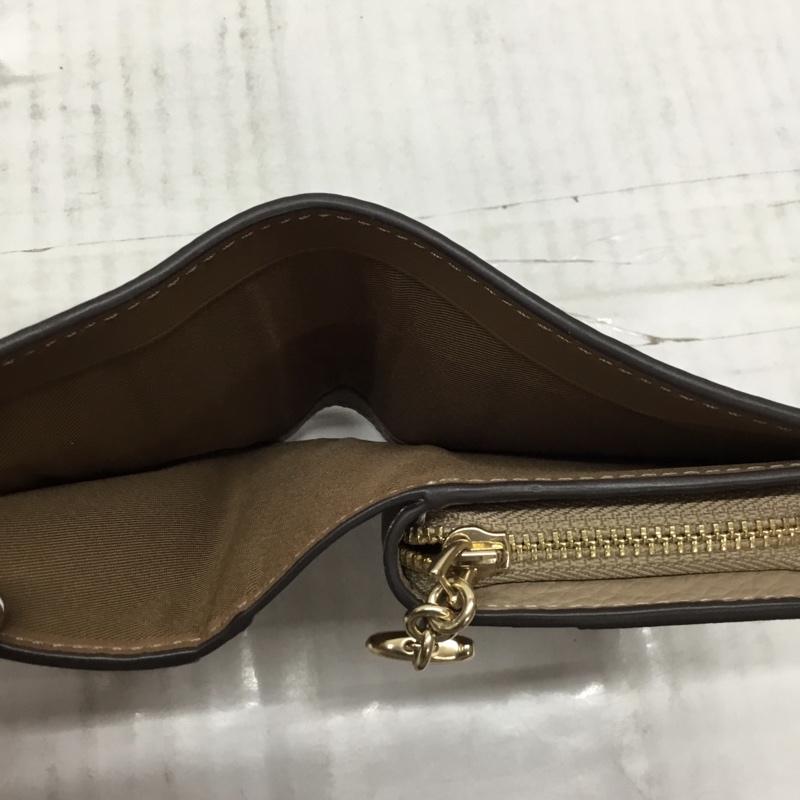 コーチ COACH 財布 二つ折り ロゴ、文字 ベージュ / ベージュ /  レディース USED 古着 中古 10109759