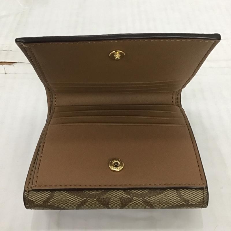 コーチ COACH 財布 二つ折り シグネチャー ロゴ、文字 ベージュ / ベージュ /  レディース USED 古着 中古 10111522