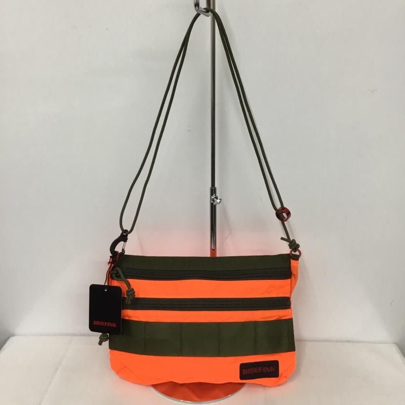 ブリーフィング BRIEFING ショルダーバッグ ショルダーバッグ BRM182201-040-001 SACOCHE S SL PACKABLE タグ有 ロゴ、文字 橙 / オレンジ /  メンズ USED 古着 中古 10145170