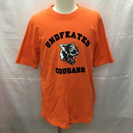 アンディフィーテッド UNDEFEATED Tシャツ 半袖 半袖カットソー プリントTシャツ クルーネックカットソー M プリント 橙 / オレンジ /  メンズ USED 古着 中古 10108964