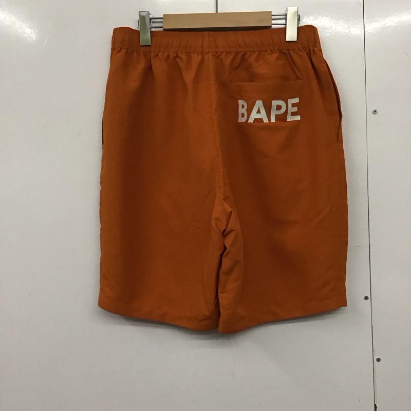 アベイシングエイプ A BATHING APE パンツ ショートパンツ ハーフパンツ ショートパンツ カジュアルパンツ L ロゴ、文字 橙 / オレンジ /  メンズ USED 古着 中古 10142630