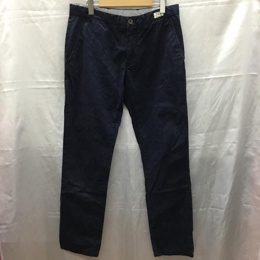 トミーヒルフィガー TOMMY HILFIGER パンツ スラックス 32インチ 無地 紺 / ネイビー /  メンズ USED 古着 中古 10110692