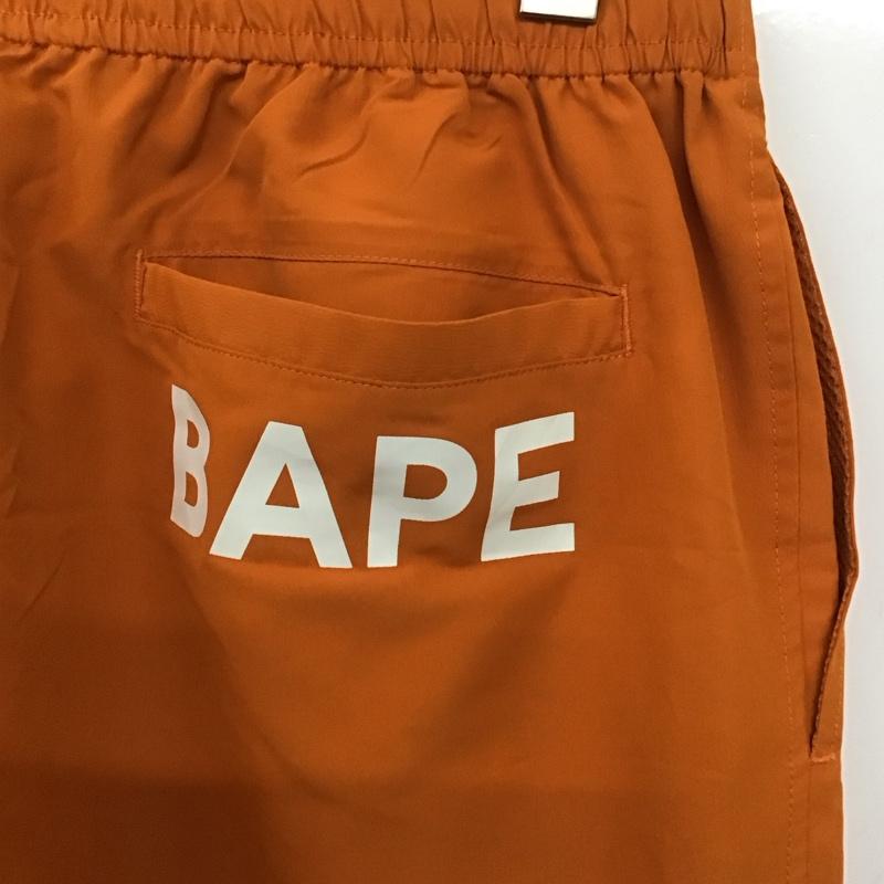 アベイシングエイプ A BATHING APE パンツ ショートパンツ ハーフパンツ ショートパンツ カジュアルパンツ L ロゴ、文字 橙 / オレンジ /  メンズ USED 古着 中古 10142630
