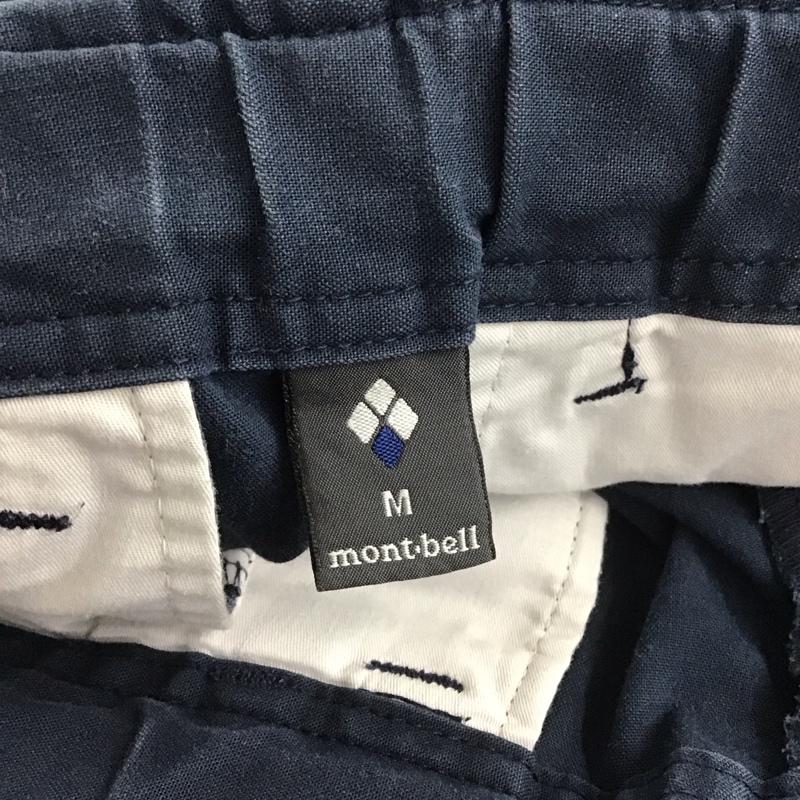 モンベル mont-bell パンツ ワークパンツ、ペインターパンツ チノパン スリムパンツ カジュアルパンツ ストレッチパンツ M ロゴ、文字 紺 / ネイビー /  メンズ USED 古着 中古 10148371