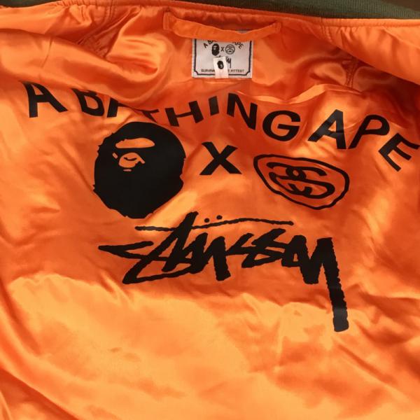 アベイシングエイプ A BATHING APE ジャケット、上着  アウター ジャケット MA-1 STUSSY×A BATHING APE リバーシブル フライトジャケット ロゴ M 無地 カーキ / カーキ / X 橙 / オレンジ /  メンズ USED 古着 中古 10026190